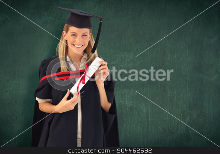 To use this stock image in your creative project, please select the size you need over to the right and click the "Add to Cart" button.
Your downloaded image will come with the Cutcaster watermark removed so don’t worry about the watermark you see on this page. Composite image of woman smiling at her graduation stock photo, Woman smiling at her graduation against green chalkboard by Wavebreak Media
