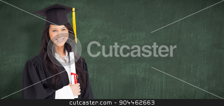 To use this stock image in your creative project, please select the size you need over to the right and click the "Add to Cart" button.
Your downloaded image will come with the Cutcaster watermark removed so don’t worry about the watermark you see on this page. Composite image of a woman standing to the side slightly with he stock photo, A woman standing to the side slightly with her degree and dressed in her graduation robe against green chalkboard by Wavebreak Media