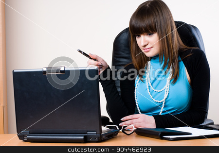 To use this stock image in your creative project, please select the size you need over to the right and click the "Add to Cart" button.
Your downloaded image will come with the Cutcaster watermark removed so don’t worry about the watermark you see on this page. Business woman with laptop stock photo, Business woman working on a laptop at the office and smiling by Aikon