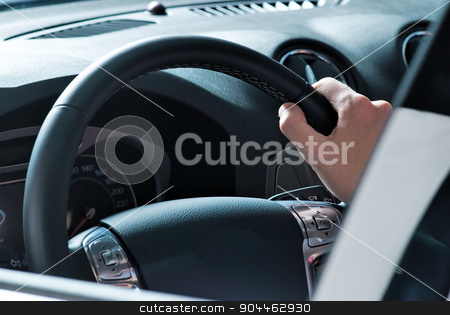 To use this stock image in your creative project, please select the size you need over to the right and click the "Add to Cart" button.
Your downloaded image will come with the Cutcaster watermark removed so don’t worry about the watermark you see on this page. Driving man stock photo, Man hands of driver on steering wheel by Aikon