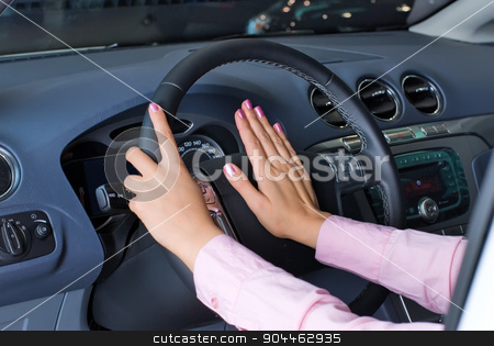 To use this stock image in your creative project, please select the size you need over to the right and click the "Add to Cart" button.
Your downloaded image will come with the Cutcaster watermark removed so don’t worry about the watermark you see on this page. Woman hands on horn button stock photo, Young woman pressing on horn signal button by Aikon