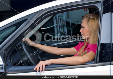 To use this stock image in your creative project, please select the size you need over to the right and click the "Add to Cart" button.
Your downloaded image will come with the Cutcaster watermark removed so don’t worry about the watermark you see on this page. Pretty woman - driver sits in car stock photo, Young attractive woman sits in car and ready to drive by Aikon