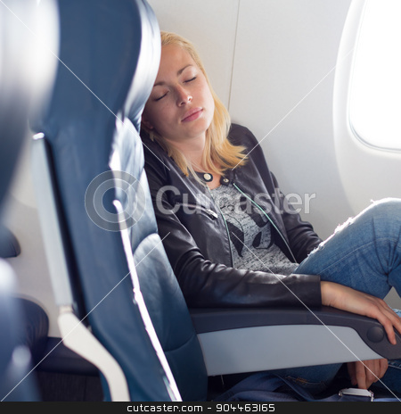 To use this stock image in your creative project, please select the size you need over to the right and click the "Add to Cart" button.
Your downloaded image will come with the Cutcaster watermark removed so don’t worry about the watermark you see on this page. Lady traveling napping on a plain. stock photo, Tired blonde casual caucasian lady napping on uncomfortable seat while traveling by airplane. Commercial transportation by planes. by kasto