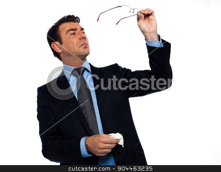 To use this stock image in your creative project, please select the size you need over to the right and click the "Add to Cart" button.
Your downloaded image will come with the Cutcaster watermark removed so don’t worry about the watermark you see on this page. Man cleaning eye glasses stock photo, man businessman cleaning glasses studio isolated on white background by Ishadow