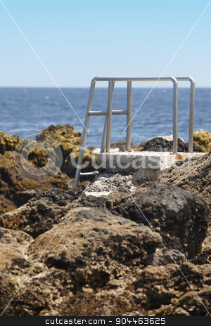 To use this stock image in your creative project, please select the size you need over to the right and click the "Add to Cart" button.
Your downloaded image will come with the Cutcaster watermark removed so don’t worry about the watermark you see on this page. Rocky pool beach stairs in Biscoitos. Terceira island. Azores. P stock photo, Rocky pool beach stairs in Biscoitos. Terceira island. Azores. Portugal. Vertical by ABBPhoto