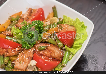 To use this stock image in your creative project, please select the size you need over to the right and click the "Add to Cart" button.
Your downloaded image will come with the Cutcaster watermark removed so don’t worry about the watermark you see on this page. Warm salad with chicken stock photo, Warm salad with chicken, vegetable and sesame seeds by olinchuk
