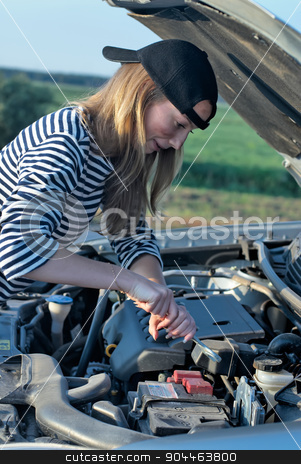 To use this stock image in your creative project, please select the size you need over to the right and click the "Add to Cart" button.
Your downloaded image will come with the Cutcaster watermark removed so don’t worry about the watermark you see on this page. Young Blond Woman With Her Broken Car stock photo, young blond woman with her broken car. The girl is angry by Aikon