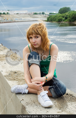 To use this stock image in your creative project, please select the size you need over to the right and click the "Add to Cart" button.
Your downloaded image will come with the Cutcaster watermark removed so don’t worry about the watermark you see on this page. Pretty girl on river bank stock photo, Young beautiful woman sitting on river bank by Aikon
