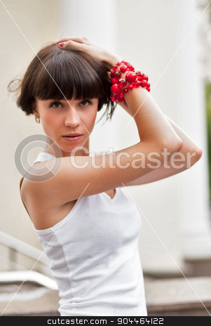 To use this stock image in your creative project, please select the size you need over to the right and click the "Add to Cart" button.
Your downloaded image will come with the Cutcaster watermark removed so don’t worry about the watermark you see on this page. Attractive sad girl with red beads stock photo, Young beautiful sad woman with red beads at city background by Aikon