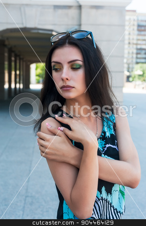 To use this stock image in your creative project, please select the size you need over to the right and click the "Add to Cart" button.
Your downloaded image will come with the Cutcaster watermark removed so don’t worry about the watermark you see on this page. Beautiful girl in bright dress at urban background stock photo, Fashion style photo of young attractive woman over urban background by Aikon