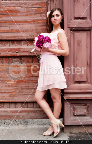 To use this stock image in your creative project, please select the size you need over to the right and click the "Add to Cart" button.
Your downloaded image will come with the Cutcaster watermark removed so don’t worry about the watermark you see on this page. beautiful woman with flower stock photo, Portrait of a beautiful blonde woman with peony flowers at old wooden house background by Aikon
