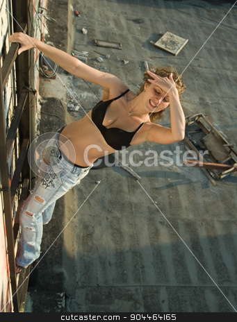 To use this stock image in your creative project, please select the size you need over to the right and click the "Add to Cart" button.
Your downloaded image will come with the Cutcaster watermark removed so don’t worry about the watermark you see on this page. Girl on stair stock photo, Young woman climbing on stair at building roof by Aikon