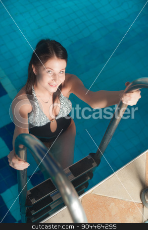 To use this stock image in your creative project, please select the size you need over to the right and click the "Add to Cart" button.
Your downloaded image will come with the Cutcaster watermark removed so don’t worry about the watermark you see on this page. Attractive girl in swimming pool stock photo, Young beautiful woman relaxing in swimming pool by Aikon
