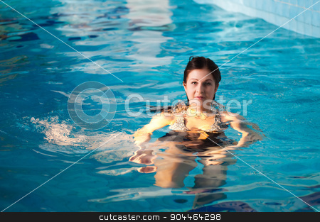 To use this stock image in your creative project, please select the size you need over to the right and click the "Add to Cart" button.
Your downloaded image will come with the Cutcaster watermark removed so don’t worry about the watermark you see on this page. Attractive girl in swimming pool stock photo, Young beautiful woman relaxing in swimming pool by Aikon