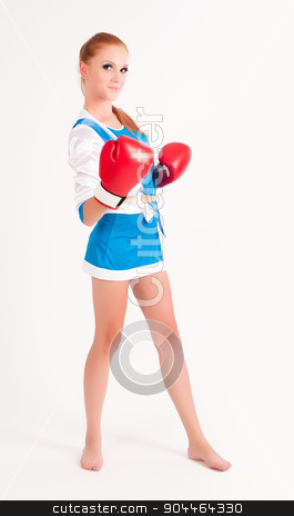 To use this stock image in your creative project, please select the size you need over to the right and click the "Add to Cart" button.
Your downloaded image will come with the Cutcaster watermark removed so don’t worry about the watermark you see on this page. woman with boxing gloves stock photo, Young beautiful woman during fitness and boxing by Aikon
