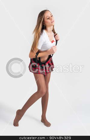 To use this stock image in your creative project, please select the size you need over to the right and click the "Add to Cart" button.
Your downloaded image will come with the Cutcaster watermark removed so don’t worry about the watermark you see on this page. young attractive woman in short skirt stock photo, Young attractive woman in short top and skirt at white background by Aikon