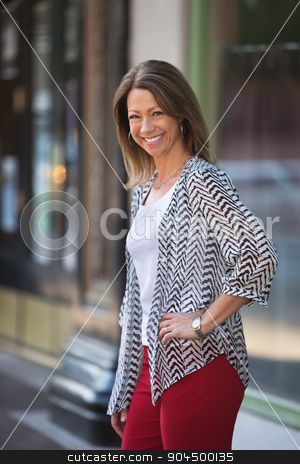 To use this stock image in your creative project, please select the size you need over to the right and click the "Add to Cart" button.
Your downloaded image will come with the Cutcaster watermark removed so don’t worry about the watermark you see on this page. Giggling Woman Outdoors stock photo, Giggling European female with red pants outdoors by Scott Griessel