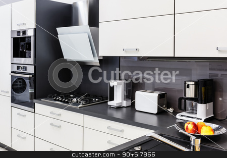 To use this stock image in your creative project, please select the size you need over to the right and click the "Add to Cart" button.
Your downloaded image will come with the Cutcaster watermark removed so don’t worry about the watermark you see on this page. Modern hi-tek kitchen, clean interior design stock photo, Modern luxury hi-tek black and white kitchen interior, clean design by Serghei Starus