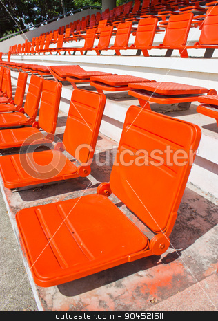 To use this stock image in your creative project, please select the size you need over to the right and click the "Add to Cart" button.
Your downloaded image will come with the Cutcaster watermark removed so don’t worry about the watermark you see on this page. Empty red stadium seats at hockey field. stock photo, Empty red stadium seats at hockey field. by Sirikorn Techatraibhop