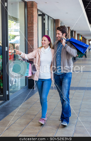 To use this stock image in your creative project, please select the size you need over to the right and click the "Add to Cart" button.
Your downloaded image will come with the Cutcaster watermark removed so don’t worry about the watermark you see on this page. Smiling couple walking hand in hand and going window shopping stock photo, Smiling couple walking hand in hand and going window shopping at shopping mall by Wavebreak Media