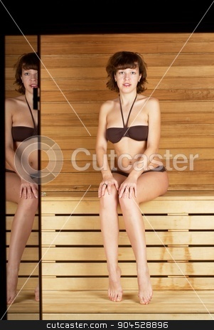 To use this stock image in your creative project, please select the size you need over to the right and click the "Add to Cart" button.
Your downloaded image will come with the Cutcaster watermark removed so don’t worry about the watermark you see on this page. Woman in sauna stock photo, Young woman sitting on wooden bench in sauna cabin by Aikon