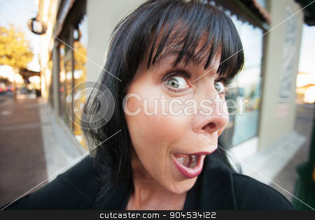 To use this stock image in your creative project, please select the size you need over to the right and click the "Add to Cart" button.
Your downloaded image will come with the Cutcaster watermark removed so don’t worry about the watermark you see on this page. Female Takes a Selfie stock photo, Woman takes an early morning selfie on downtown street by Scott Griessel