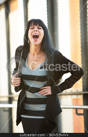 To use this stock image in your creative project, please select the size you need over to the right and click the "Add to Cart" button.
Your downloaded image will come with the Cutcaster watermark removed so don’t worry about the watermark you see on this page. Attractive Woman Laughing stock photo, Attractive woman in striped dress standing and laughing by Scott Griessel