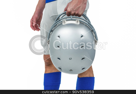 To use this stock image in your creative project, please select the size you need over to the right and click the "Add to Cart" button.
Your downloaded image will come with the Cutcaster watermark removed so don’t worry about the watermark you see on this page. Midsection of American football player handing his helmet stock photo, Midsection of American football player handing his helmet on a white background by Wavebreak Media