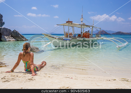 To use this stock image in your creative project, please select the size you need over to the right and click the "Add to Cart" button.
Your downloaded image will come with the Cutcaster watermark removed so don’t worry about the watermark you see on this page. Young woman reaxing on the beach at exotic resort stock photo, Young Latino woman reaxing on the beach at exotic resort by Vassiliy Kochetkov