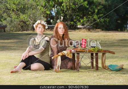 To use this stock image in your creative project, please select the size you need over to the right and click the "Add to Cart" button.
Your downloaded image will come with the Cutcaster watermark removed so don’t worry about the watermark you see on this page. Two Serious Pagans at Altar stock photo, Two serious pagan females sitting at altar with pentagram by Scott Griessel