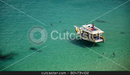 To use this stock image in your creative project, please select the size you need over to the right and click the "Add to Cart" button.
Your downloaded image will come with the Cutcaster watermark removed so don’t worry about the watermark you see on this page. Boat in a Crystalline sea beach in Fernando de Noronha,Brazil stock photo, Boat in a Crystalline sea beach in Fernando de Noronha,Brazil by Elder Vieira Salles