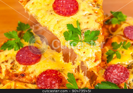To use this stock image in your creative project, please select the size you need over to the right and click the "Add to Cart" button.
Your downloaded image will come with the Cutcaster watermark removed so don’t worry about the watermark you see on this page. hot pizza with salami closeup stock photo, hot pizza with salami closeup on wooden background by MegaArt