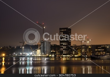To use this stock image in your creative project, please select the size you need over to the right and click the "Add to Cart" button.
Your downloaded image will come with the Cutcaster watermark removed so don’t worry about the watermark you see on this page. Modern apartment buildings stock photo, Modern apartment buildings in new neighborhood at night. by a40757
