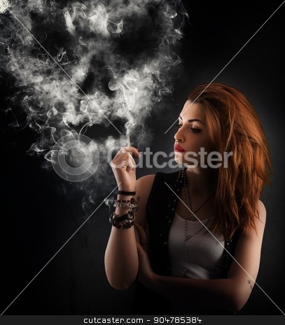 To use this stock image in your creative project, please select the size you need over to the right and click the "Add to Cart" button.
Your downloaded image will come with the Cutcaster watermark removed so don’t worry about the watermark you see on this page. Dangerous smoking stock photo, Girl smokes a cigarette forming a skull by Federico Caputo