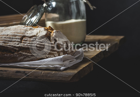 To use this stock image in your creative project, please select the size you need over to the right and click the "Add to Cart" button.
Your downloaded image will come with the Cutcaster watermark removed so don’t worry about the watermark you see on this page. Home-baked sourdough bread stock photo, Home-baked sourdough bread, wheat-rye rustic, product photo, ready for your dark advertisment, place for text by Peteer
