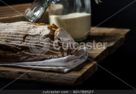 To use this stock image in your creative project, please select the size you need over to the right and click the "Add to Cart" button.
Your downloaded image will come with the Cutcaster watermark removed so don’t worry about the watermark you see on this page. Home-baked sourdough bread stock photo, Home-baked sourdough bread, wheat-rye rustic, product photo, ready for your dark advertisment, place for text by Peteer
