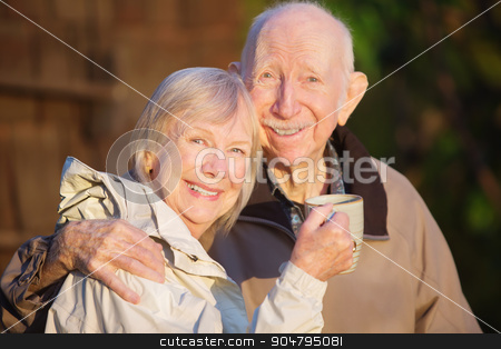 To use this stock image in your creative project, please select the size you need over to the right and click the "Add to Cart" button.
Your downloaded image will come with the Cutcaster watermark removed so don’t worry about the watermark you see on this page. Happily Married Couple stock photo, Happily married senior couple outdoors with coffee outdoors by Scott Griessel