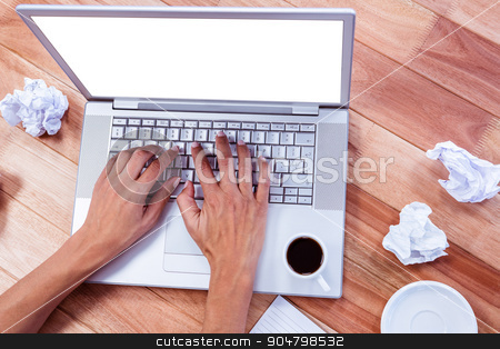 To use this stock image in your creative project, please select the size you need over to the right and click the "Add to Cart" button.
Your downloaded image will come with the Cutcaster watermark removed so don’t worry about the watermark you see on this page. Part of hands typing on laptop stock photo, Part of hands typing on laptop on wooden desk by Wavebreak Media