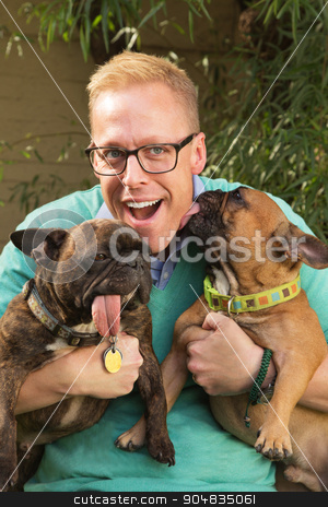 To use this stock image in your creative project, please select the size you need over to the right and click the "Add to Cart" button.
Your downloaded image will come with the Cutcaster watermark removed so don’t worry about the watermark you see on this page. Dogs Licking Man stock photo, Smiling man with eyeglasses being kissed by pair of dogs by Scott Griessel