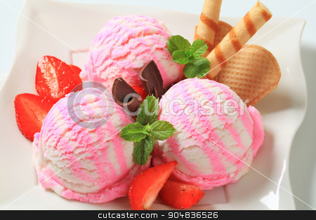 To use this stock image in your creative project, please select the size you need over to the right and click the "Add to Cart" button.
Your downloaded image will come with the Cutcaster watermark removed so don’t worry about the watermark you see on this page. Ice cream dessert stock photo, Ice cream sundae with strawberries and wafer rolls by Digifoodstock