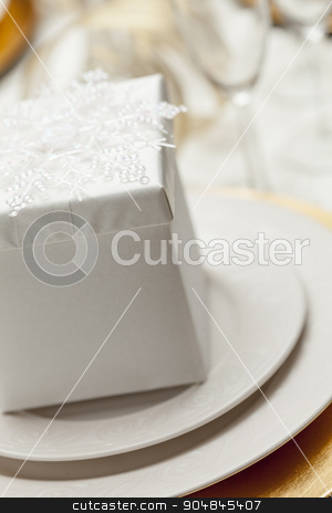 To use this stock image in your creative project, please select the size you need over to the right and click the "Add to Cart" button.
Your downloaded image will come with the Cutcaster watermark removed so don’t worry about the watermark you see on this page. Christmas Gift with Place Setting at Table stock photo, Beautiful Christmas Gift with Place Setting Abstract at Table. by Andy Dean