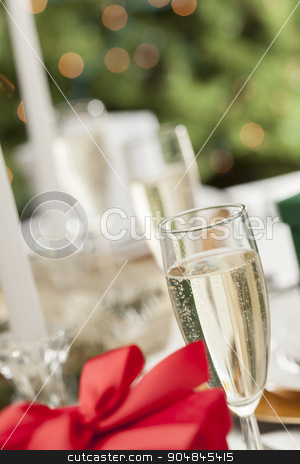 To use this stock image in your creative project, please select the size you need over to the right and click the "Add to Cart" button.
Your downloaded image will come with the Cutcaster watermark removed so don’t worry about the watermark you see on this page. Christmas Gift with Place Setting at Table stock photo, Beautiful Christmas Gift with Place Setting Abstract at Table. by Andy Dean