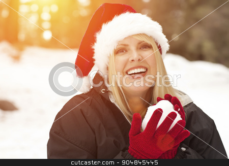 To use this stock image in your creative project, please select the size you need over to the right and click the "Add to Cart" button.
Your downloaded image will come with the Cutcaster watermark removed so don’t worry about the watermark you see on this page. Attractive Santa Hat Wearing Blond Woman Having Fun in Snow stock photo, Attractive Santa Hat Wearing Blond Woman Having Fun in The Snow on a Winter Day. by Andy Dean