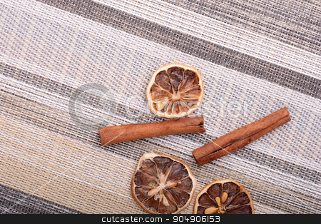 To use this stock image in your creative project, please select the size you need over to the right and click the "Add to Cart" button.
Your downloaded image will come with the Cutcaster watermark removed so don’t worry about the watermark you see on this page. Slices of fresh dried lemon, orange and spices for cooking or baking stock photo, Slices of fresh dried lemon, orange and spices for cooking or baking by Sergey Lysenkov