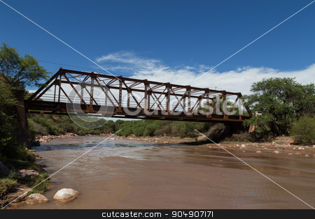 To use this stock image in your creative project, please select the size you need over to the right and click the "Add to Cart" button.
Your downloaded image will come with the Cutcaster watermark removed so don’t worry about the watermark you see on this page. Steel Bridge Construction in Alemania, Argentina stock photo, Photograph of a steel bridge construction over a river in the small village Alemania, Argentina. by Oliver Foerstner