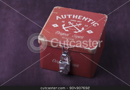 To use this stock image in your creative project, please select the size you need over to the right and click the "Add to Cart" button.
Your downloaded image will come with the Cutcaster watermark removed so don’t worry about the watermark you see on this page. Vintage box with lock stock photo, Vintage red box on a brown background by HOMON OLEKSANDR