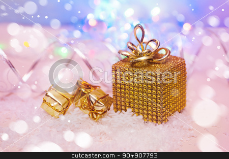 To use this stock image in your creative project, please select the size you need over to the right and click the "Add to Cart" button.
Your downloaded image will come with the Cutcaster watermark removed so don’t worry about the watermark you see on this page. Christmas presents wrapped in gold stock photo, Christmas presents wrapped in gold. by timonko