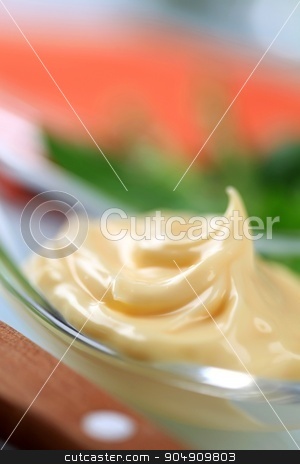 To use this stock image in your creative project, please select the size you need over to the right and click the "Add to Cart" button.
Your downloaded image will come with the Cutcaster watermark removed so don’t worry about the watermark you see on this page. Salad dressing stock photo, Swirl of salad dressing on a spoon by Digifoodstock