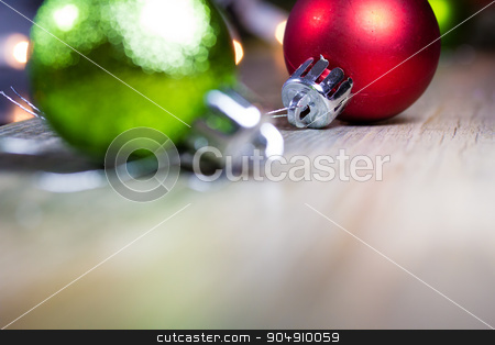To use this stock image in your creative project, please select the size you need over to the right and click the "Add to Cart" button.
Your downloaded image will come with the Cutcaster watermark removed so don’t worry about the watermark you see on this page. Shiny Christmas Ornaments Background stock photo, Colorful Christmas ornaments on a wooden background. by Jason Enterline