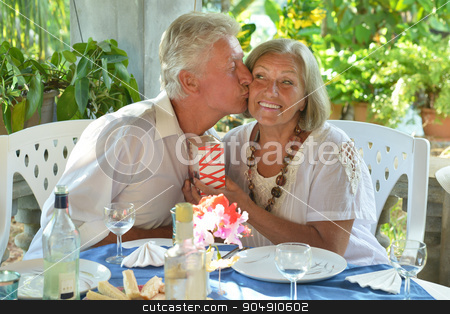 To use this stock image in your creative project, please select the size you need over to the right and click the "Add to Cart" button.
Your downloaded image will come with the Cutcaster watermark removed so don’t worry about the watermark you see on this page. Mature couple at restaurant stock photo, Happy mature couple eating dinner at restaurant by Ruslan Huzau